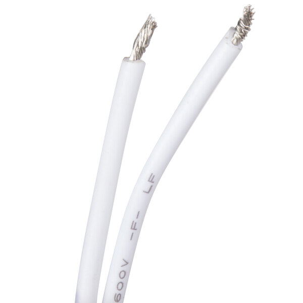 The Avantco motor run capacitor with two white cables.