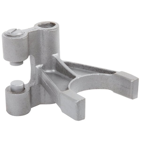 A metal fork bracket with two holes and screws.