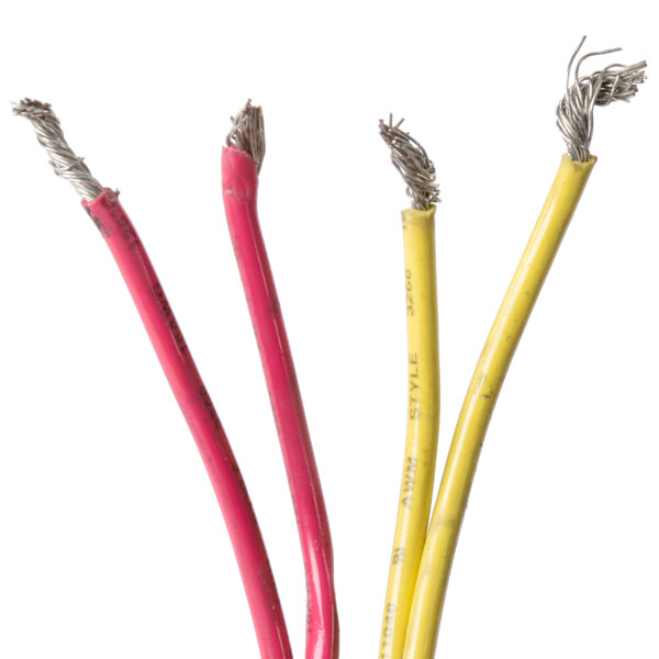 A motor with three wires, including yellow and pink wires.