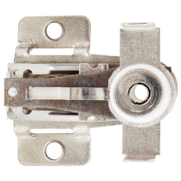 A metal piece with a white circle.