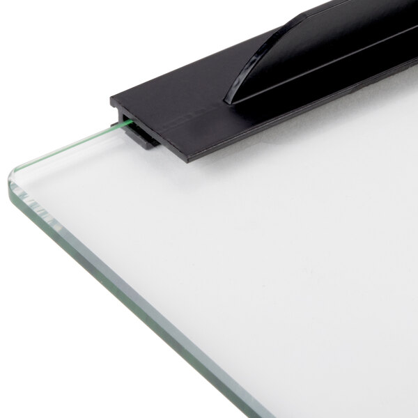 A black rectangular glass board with a white edge.