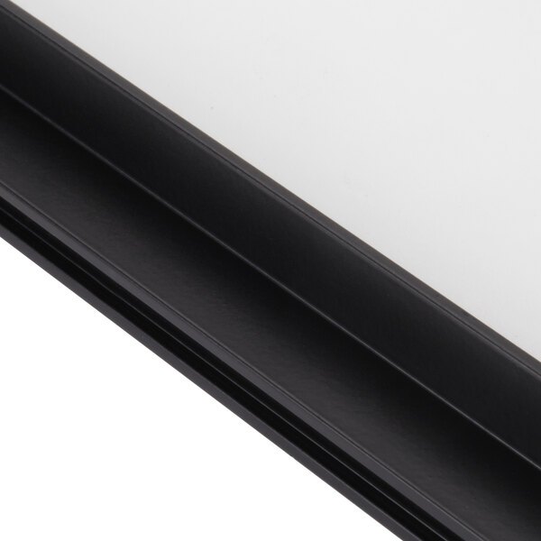 The black metal frame of an Avantco countertop food warmer glass door.