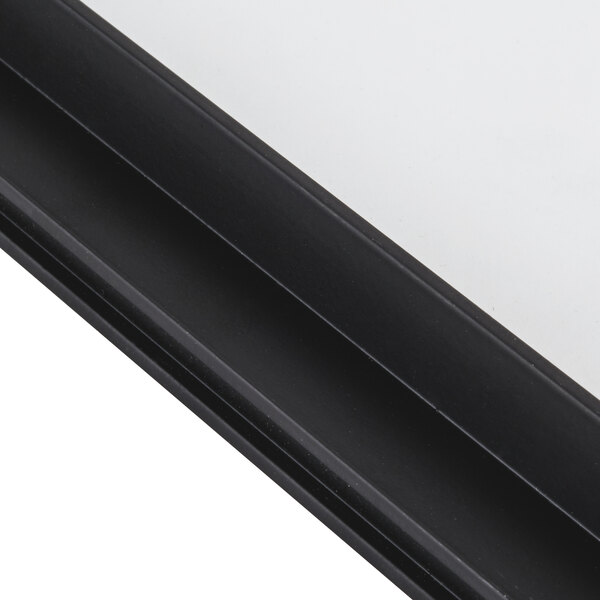 A white Avantco glass door with a black frame.