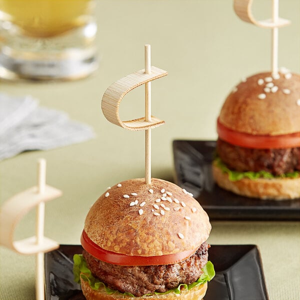 A burger with a Tablecraft bamboo pick in it.