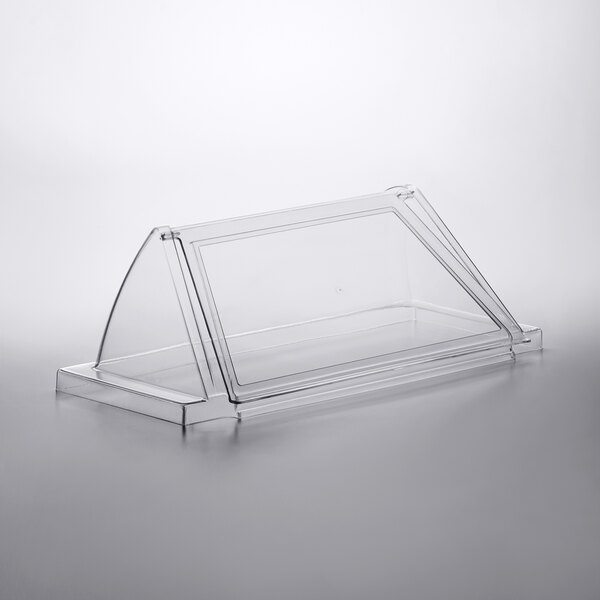 A clear plastic sneeze guard for an Avantco RG1812 hot dog roller grill.