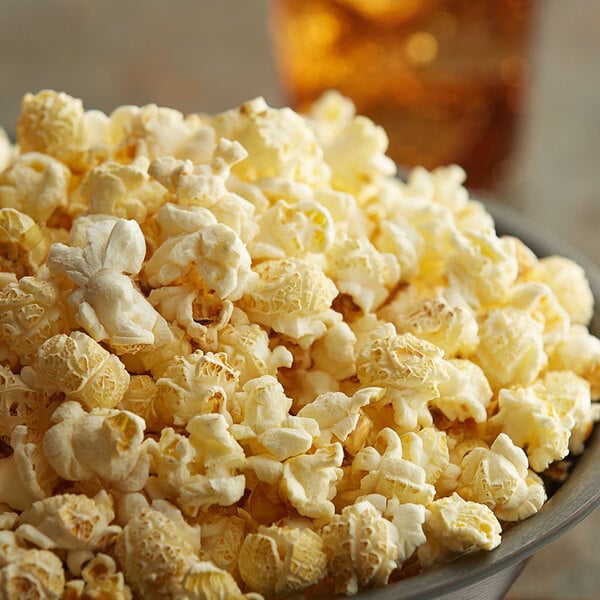 A bowl of Carnival King extra large mushroom popcorn kernels.