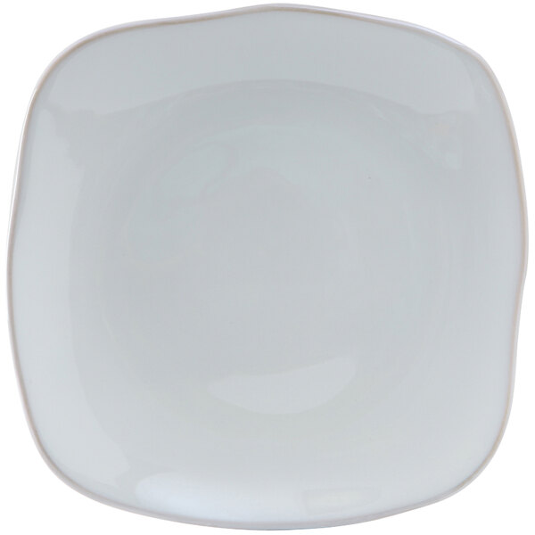 A white square Tuxton Artisan china plate with a small curved edge.