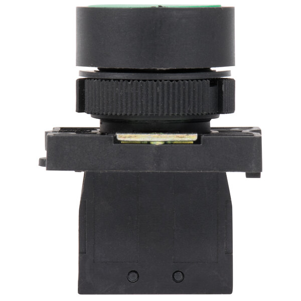 A black plastic round push button with a green circle.