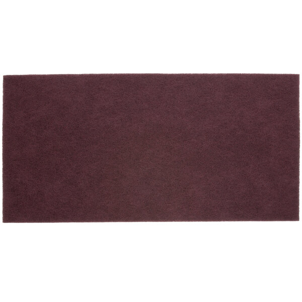 A rectangular brown 3M Scotch-Brite surface preparation pad.
