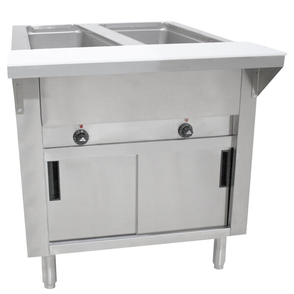 A stainless steel Advance Tabco commercial steam table with two sliding doors.