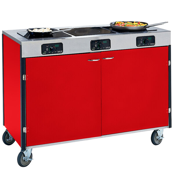 A red and silver Lakeside mobile cooking cart with three induction burners.