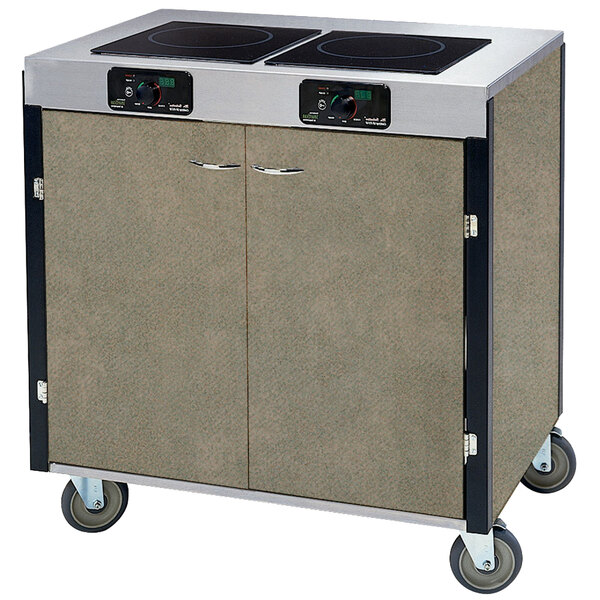 A large metal cart with two induction burners on a beige laminate top.