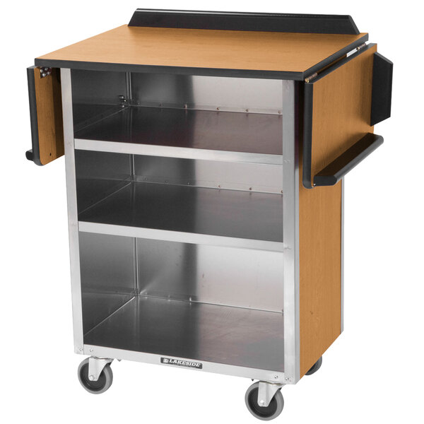 A Lakeside stainless steel beverage service cart with a light maple laminate drop-leaf top and shelves on wheels.