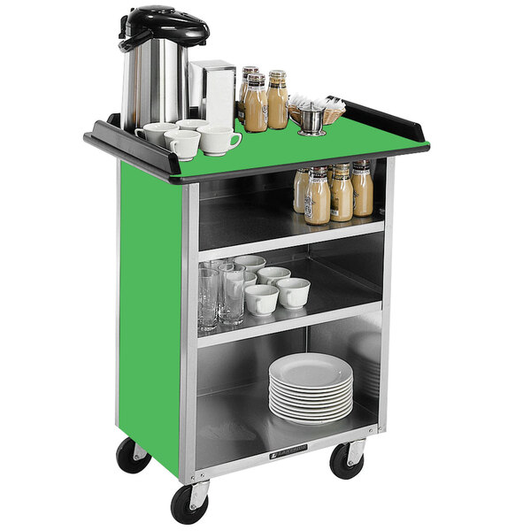 A Lakeside stainless steel beverage service cart with a green laminate surface holding a coffee pot and cups.