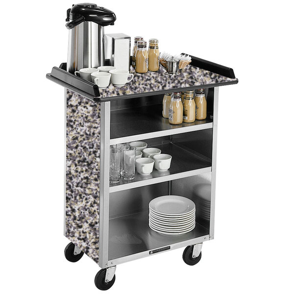 A Lakeside stainless steel beverage service cart with a gray sand laminate finish and a variety of dishes on it.