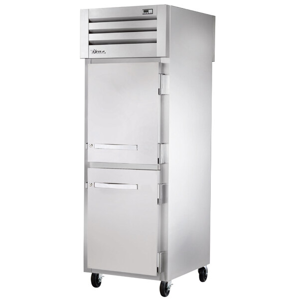 A True Spec Series pass-through freezer with white doors and silver handles.