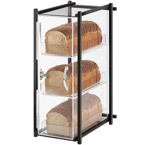 A black Cal-Mil glass display case with bread on three tiers.