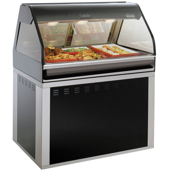 A black Alto-Shaam food display case with curved glass full of food trays.