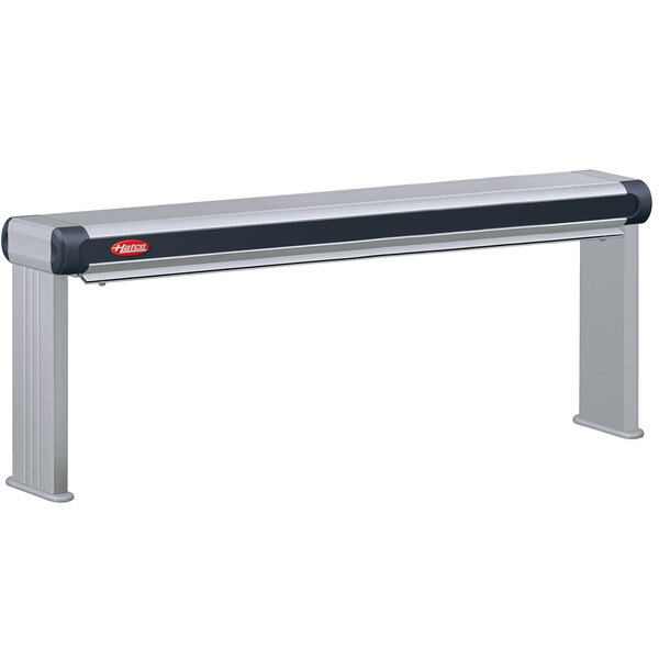 A long metal rectangular strip with a black border and red and black handles.