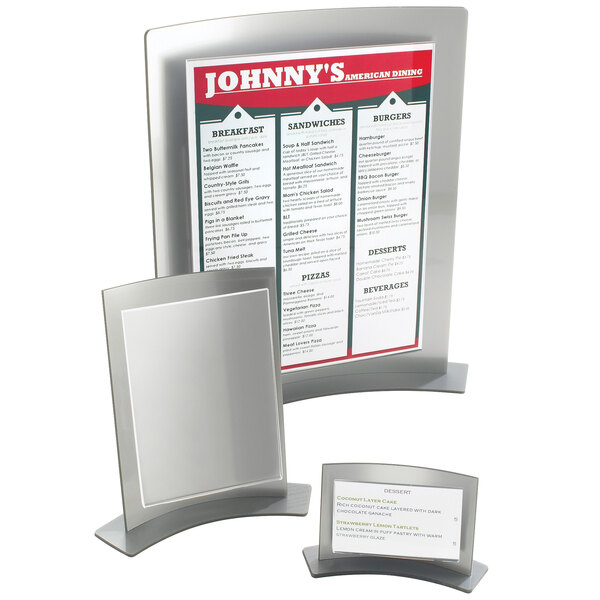 A Cal-Mil Forma Frame Displayette holding a menu card on a counter.