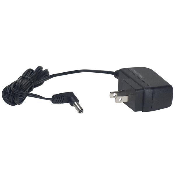 A black Cardinal Detecto 6V AC adapter with a power cord attached.