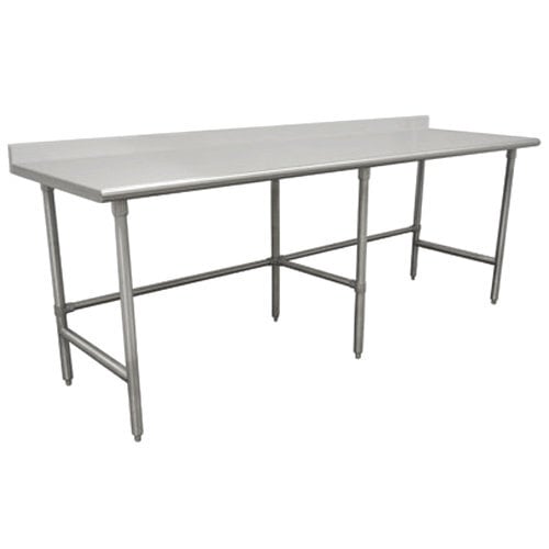 An Advance Tabco stainless steel work table with an open base and white surface.
