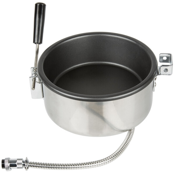 A silver and black stainless steel Carnival King kettle with a hose.