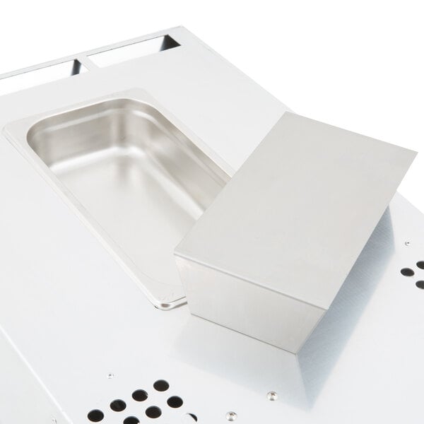 An Avantco holding and proofing control drawer assembly, a metal container inside a metal box.