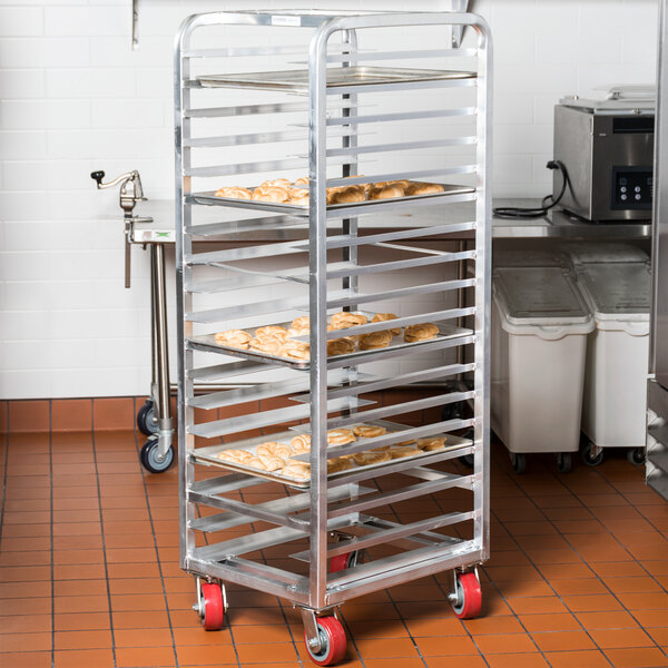 A Channel bun pan rack holding trays of pastries.