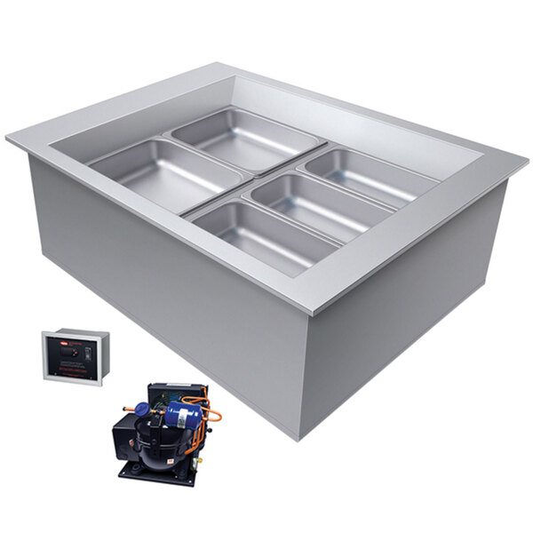 A large rectangular stainless steel Hatco drop-in cold food well with two slanted trays inside.
