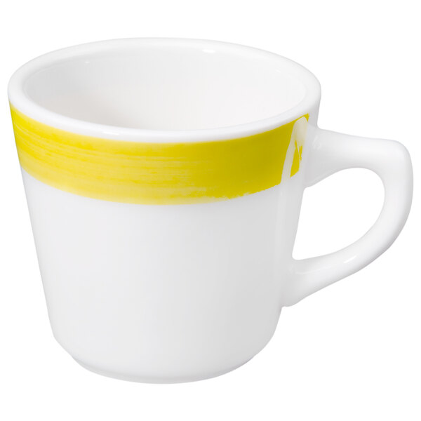 A white stoneware coffee cup with yellow stripes and rolled edges.