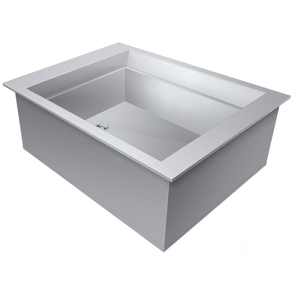 A white rectangular Hatco drop-in food well with a slanted bottom and a drain.