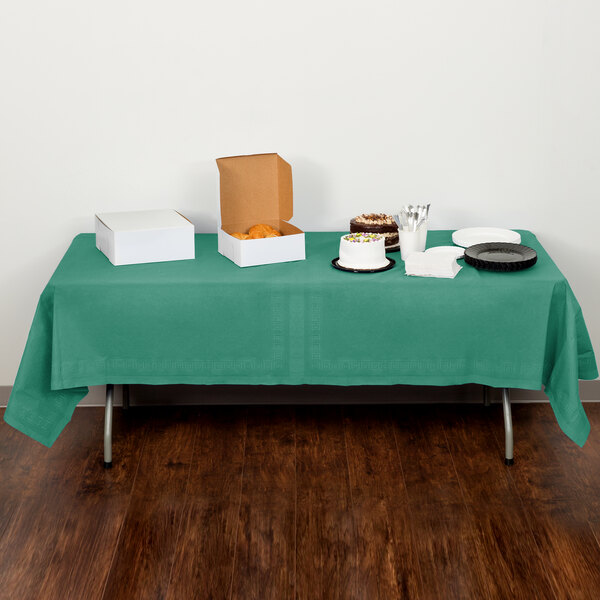 Creative Converting 713124 54" x 108" Hunter Green Tissue / Poly Table Cover