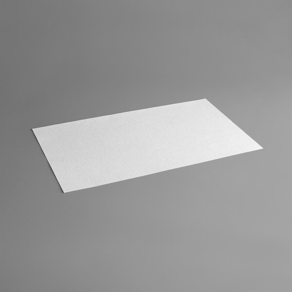 A rectangular white piece of filter paper.