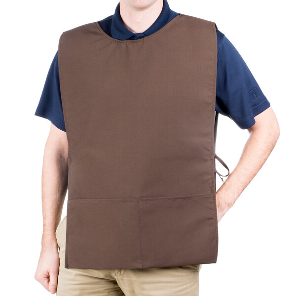 A man wearing a brown Intedge cobbler apron with two pockets.