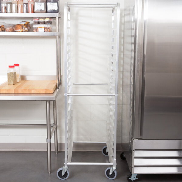 A stainless steel Cres Cor end load bun/sheet pan rack.