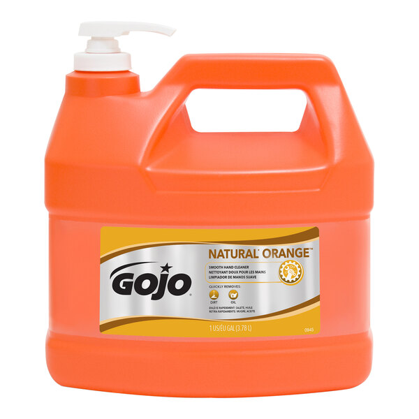 A plastic jug of GOJO Natural Orange liquid hand soap with a white pump.