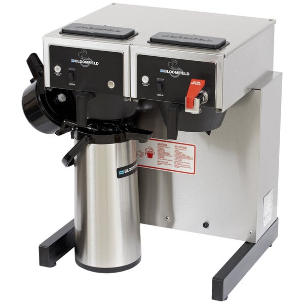 A Bloomfield airpot coffee brewer machine with stainless steel containers.