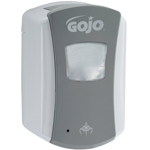 A grey GOJO touchless hand soap dispenser with white accents.