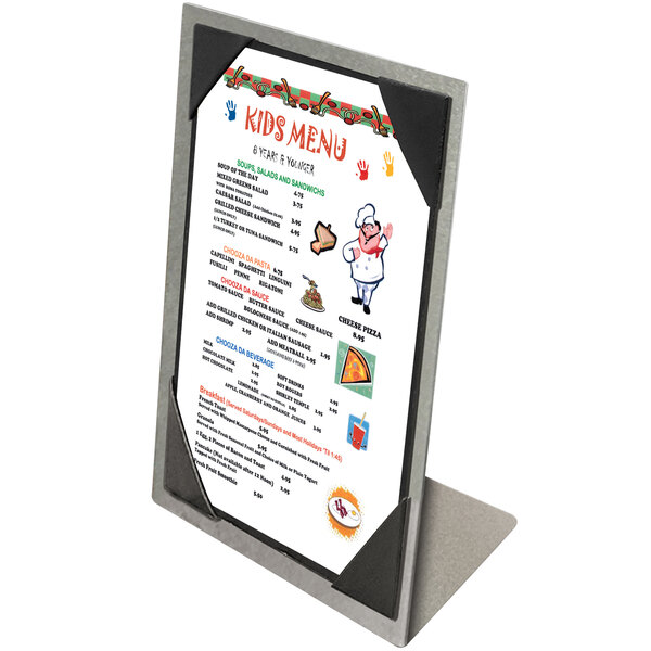A Menu Solutions Alumitique aluminum menu tent with picture corners holding a menu on a stand.