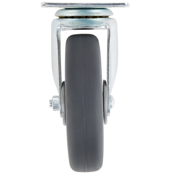 A close-up of a black rubber swivel plate caster wheel.