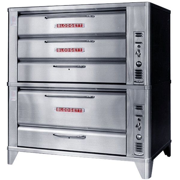 A large metal Blodgett double deck oven with drawers.
