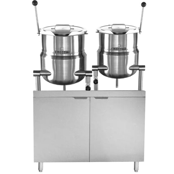 A Blodgett double steam jacketed kettle with two stainless steel pots on a stand.
