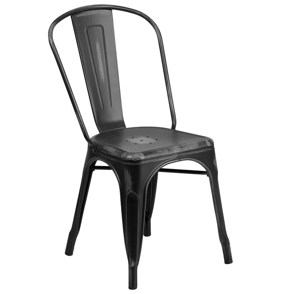 A Flash Furniture black metal restaurant chair with a vertical slat back and drain holes.