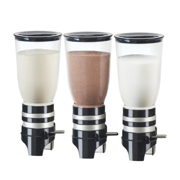 A black wall mount with three Cal-Mil glass canisters filled with milk, chocolate, and sugar.
