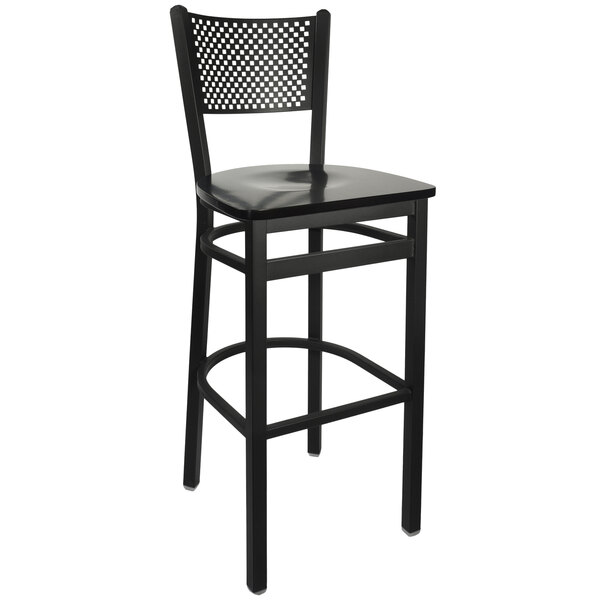 A BFM Seating black metal bar height chair with a black seat and back.