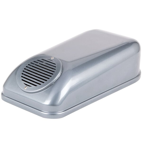 A silver metal rectangular vent cover with a small hole.