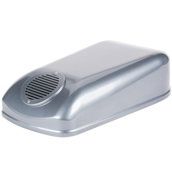 A silver rectangular cover with a vent.