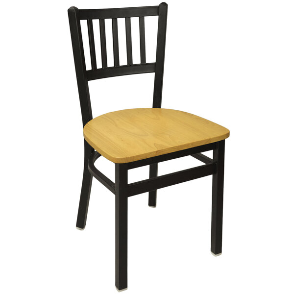 A BFM Seating black metal side chair with a natural wood seat.