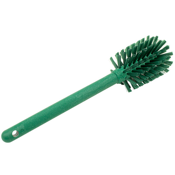 A green Carlisle Sparta Spectrum bottle cleaning brush with a handle.
